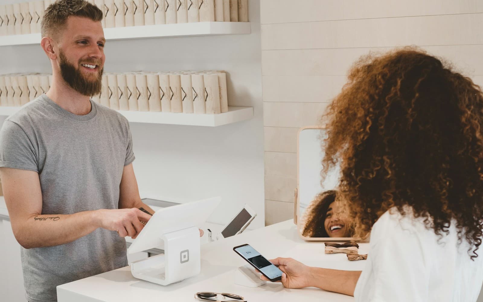 Shopper completing a purchase at checkout
