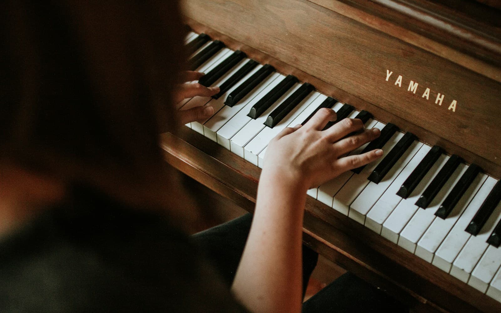 Music school classroom with piano and instruments